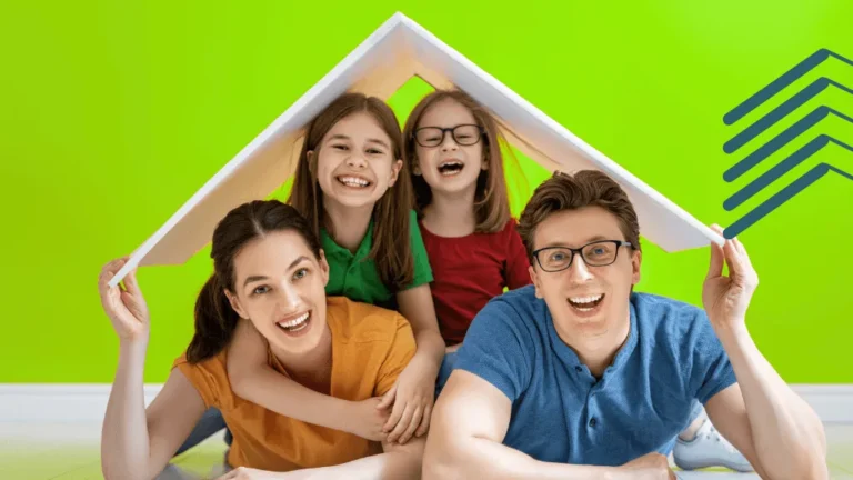 A happy family of four shelters under a symbolic roof, representing the security of finding the right multi family real estate for sale as an investment
